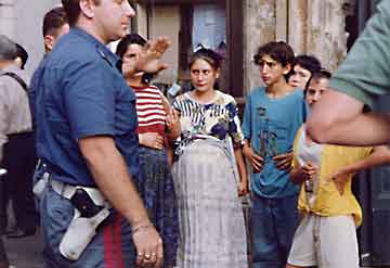 Teenage pickpockets in Rome, confronted.