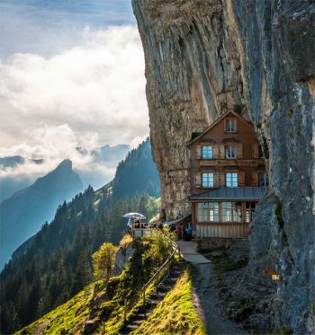 The Aescher restaurant hugs the side of a mountain in Switzerland