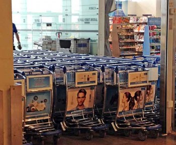 Stockholm airport Arlanda shopping: This is the way to the gates and lounge right after security at Stockholm's Arlanda airport. For years, the exit has been blocked by luggage carts.