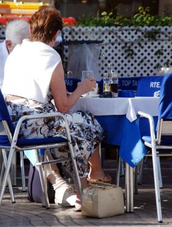 Bag snatch cafe. This unattended purse could disappear in a second.