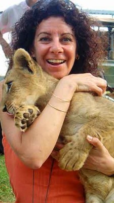 Bambi played, Bob wrestled, with a 14-week-old lion cub.