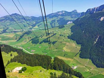 A cable car goes up the mountain, but at the top, there’s still a dramatic and perilous hike to get to the Aescher Restaurant: along cliff edges, through a dark wet cave, past bear bones, and along slippery rocky paths.