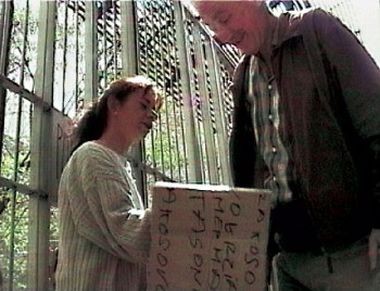 Pickpocket beggars: Gamila demonstrates her cardboard pickpocket method.