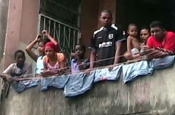 Muggers in Colon, Panama: People watch us from balconies all around us. Some dance. Quite a few men hold babies.