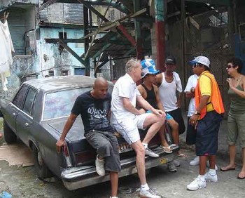 Muggers in Colon, Panama: Seeking a little privacy, we move the two gangsters and our translator to a nearby alley, but others follow, curious.