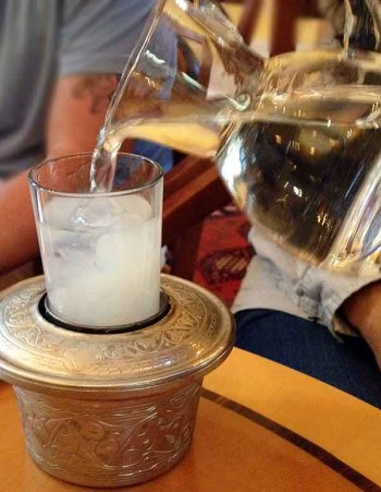 Beautiful presentation of raki, the local anise liquor, to which water is added.