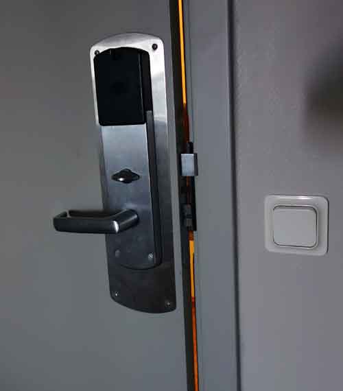 Hotel room door: security: From the inside, you can see the bolt of this hotel room door was thrown.