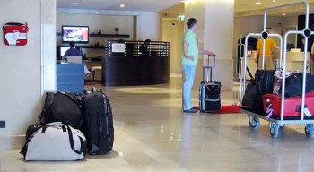 Hotel luggage storage: Who's watching the luggage? The single harried receptionist?