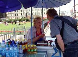 Bob speaks to the ice cream seller, who has contraband to pass off.