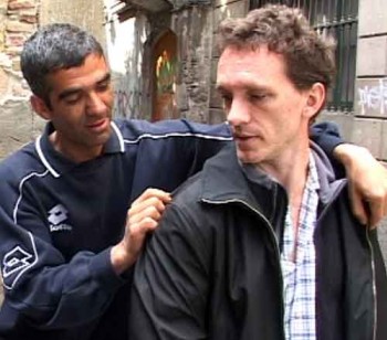 Pickpocket Kharem gets the victim to look back at his right shoulder. Meanwhile, his left hand opens the victim's left front jacket, exposing the breast pocket. How pickpockets steal from inside jacket pockets. steal from breast pocket