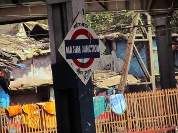 In a Mumbai slum: The Mahim Junction train station, with Dharavi behind