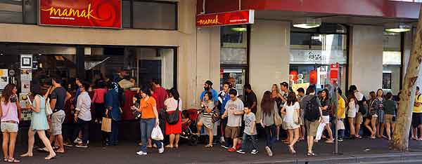 Just part of the line of people waiting to get into Mamak.