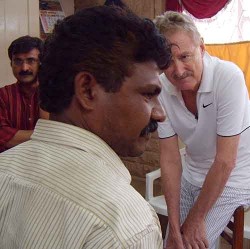 Street crime in Mumbai, India: Bob Arno questions a thief in custody.