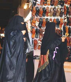 Many women in Oman are completely covered, even their eyes.