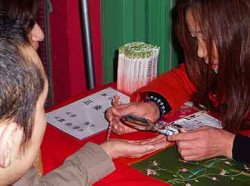 A palm reader in Yokohama's Chinatown