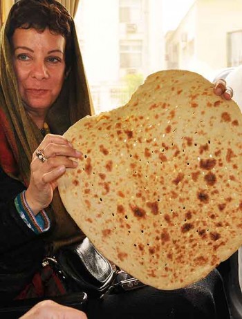 In Iran: Bambi with fresh, warm Persian bread.