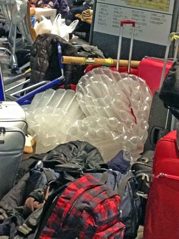 Tokyo Narita airport:  A jumble of travelers' belongings and precious air mattresses.