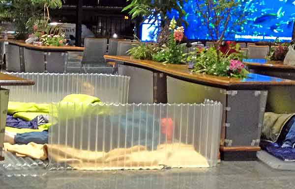 Tokyo Narita airport: Bubble-wrap fortress: more comfort than the digital aquarium in the background.