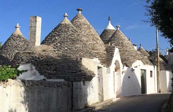 Trulli, conical stone buildings, in Alberobello, Italy.