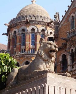 Street crime in Mumbai, India: A small part of the gorgeous Victoria Terminus train station in Mumbai, now called the Chhatrapati Shivaji Terminus.