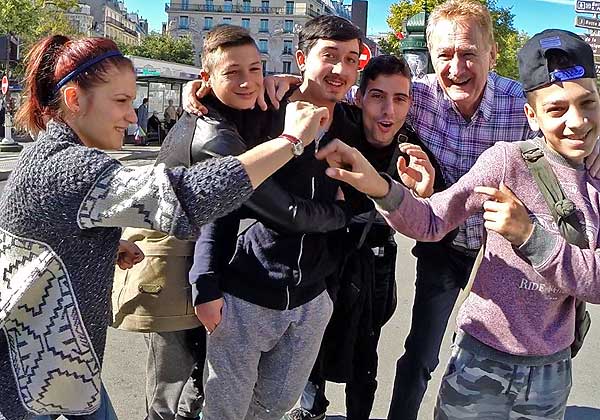 Paris pickpockets: The youngest child pickpocket called for a group photo. They posed and clowned, but none of them took photos of their own.