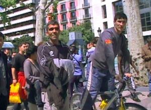 How pickpockets pick victims: Kharem, center, is a busy pickpocket in Barcelona.